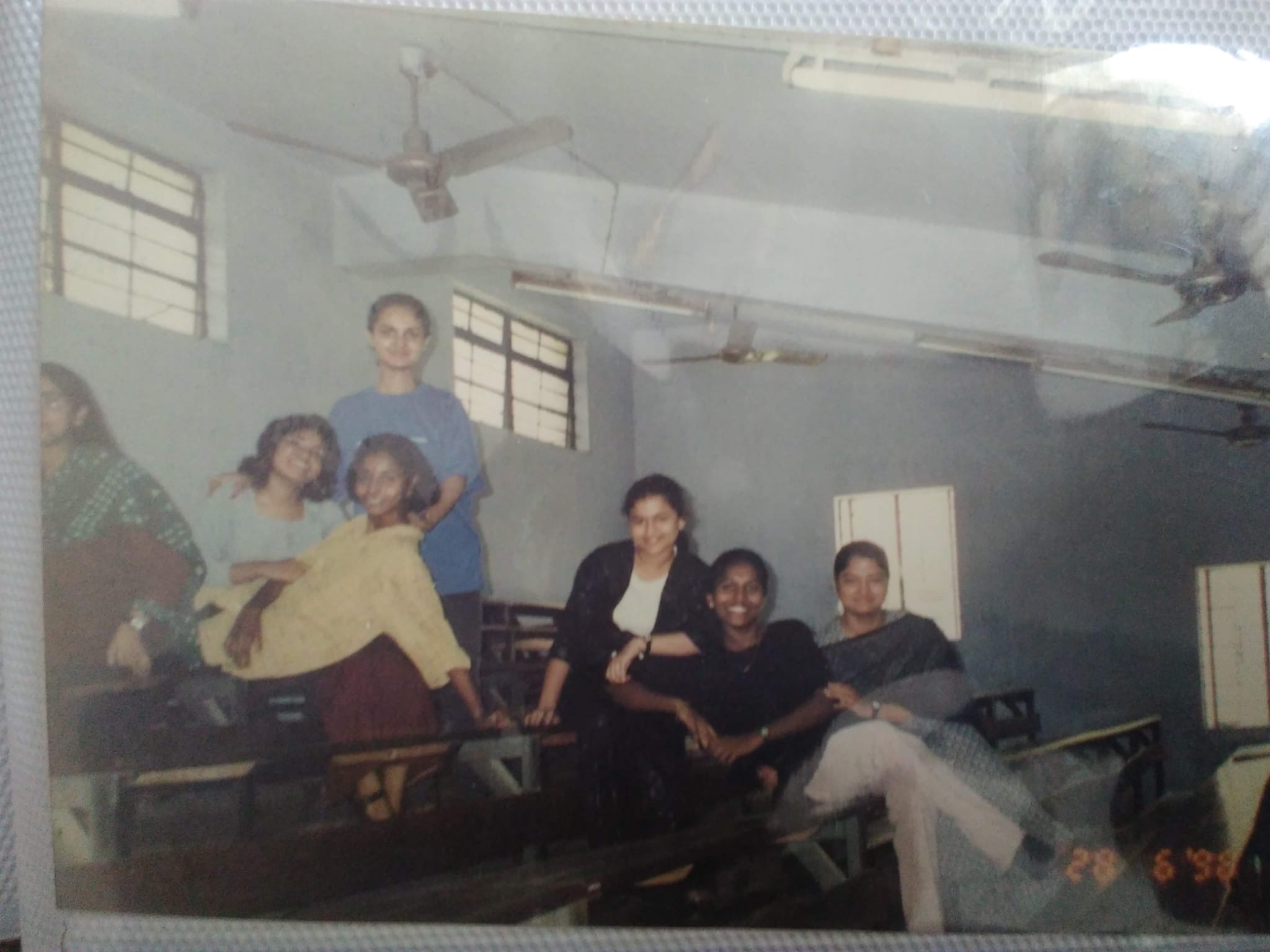 Batchmates hanging out in a classroom, June 1998